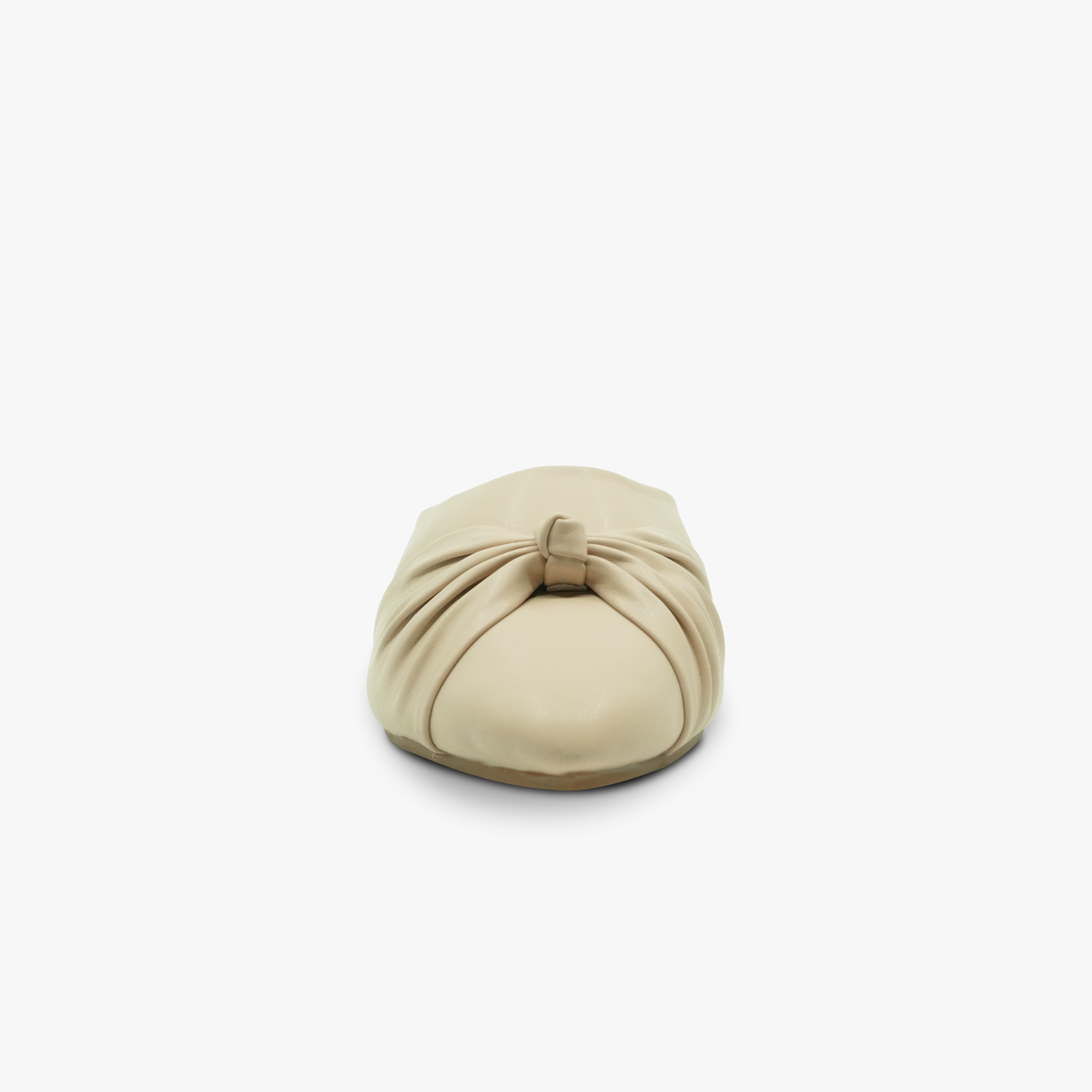 “Top view of padded insole and Khowai branding on beige knotted mules”