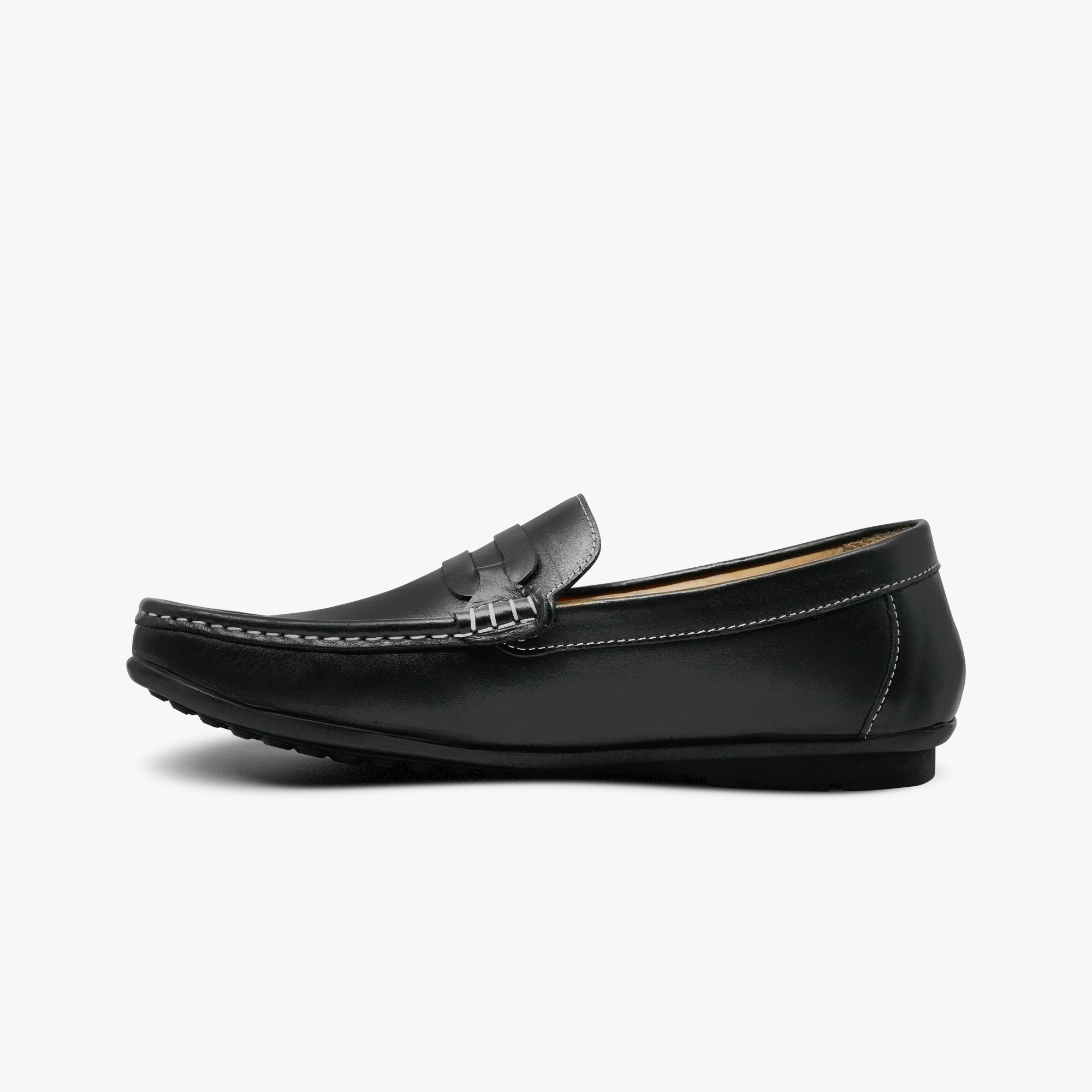 “Profile shot of black leather Eid loafers with driver-style outsole”