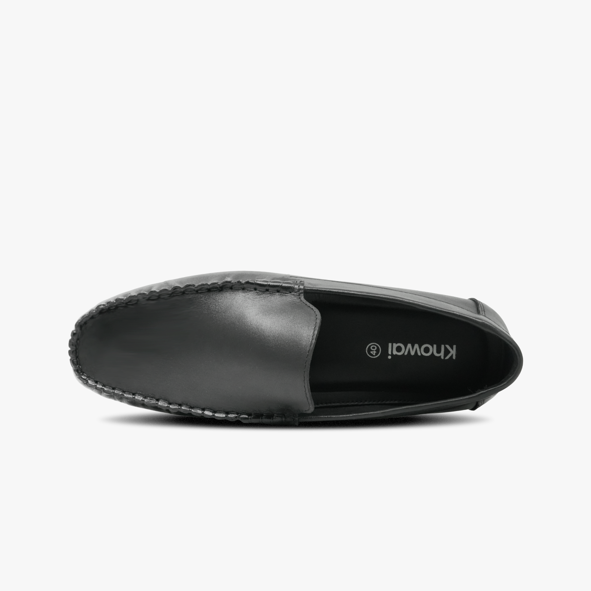 “Side profile of men’s black moccasin loafers from Khowai, featuring smooth leather”