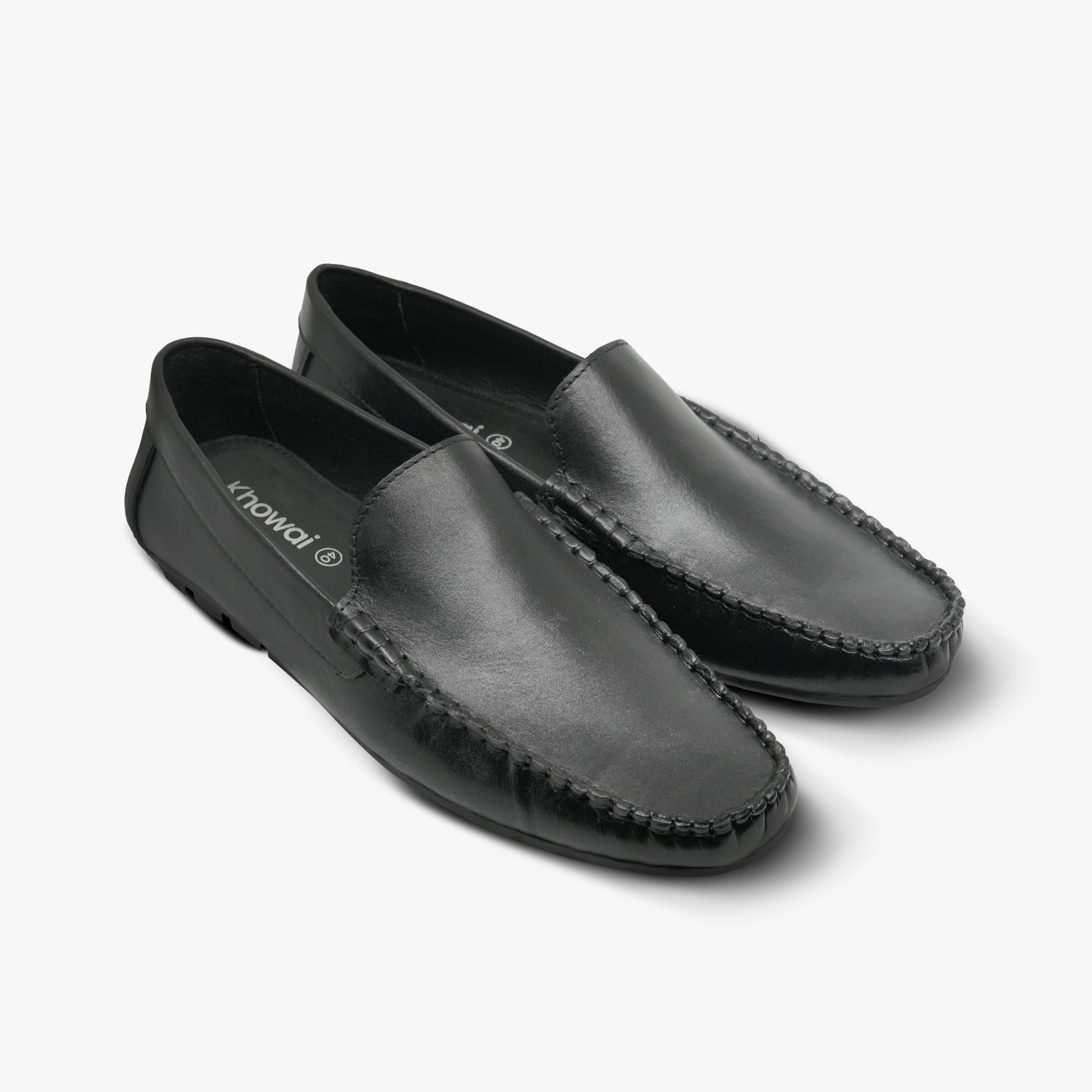 “Pair of Khowai black moc toe loafers showing slip-on design and stitching”