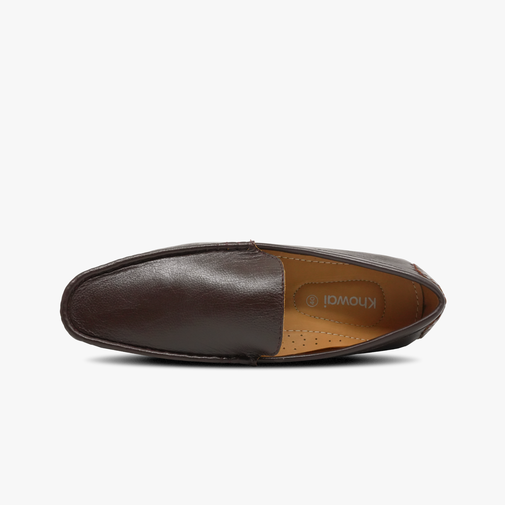 “Top view of cushioned footbed in Khowai men’s brown moccasin loafers”