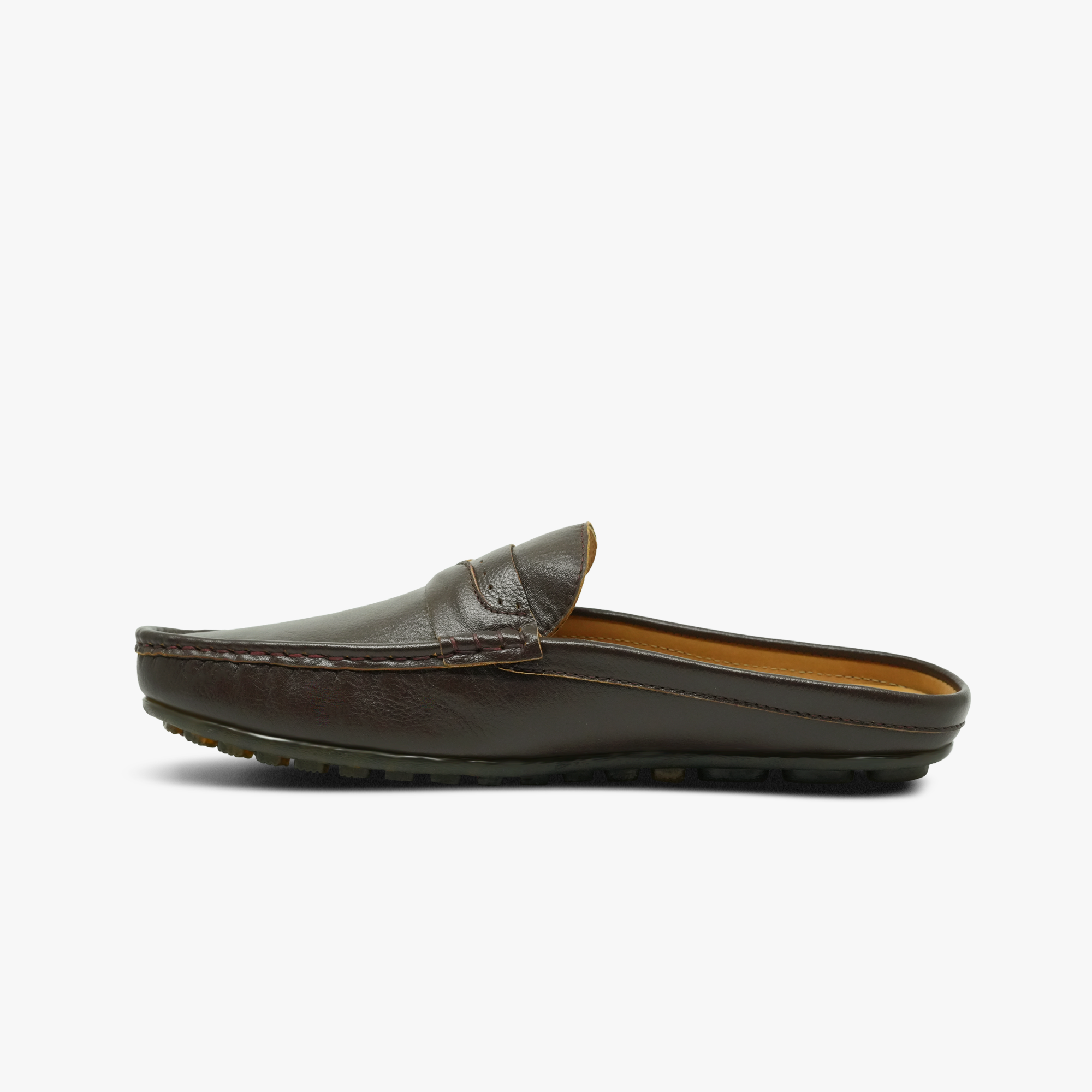 “Alternate side shot of Khowai open-back loafers with penny strap in brown leather”