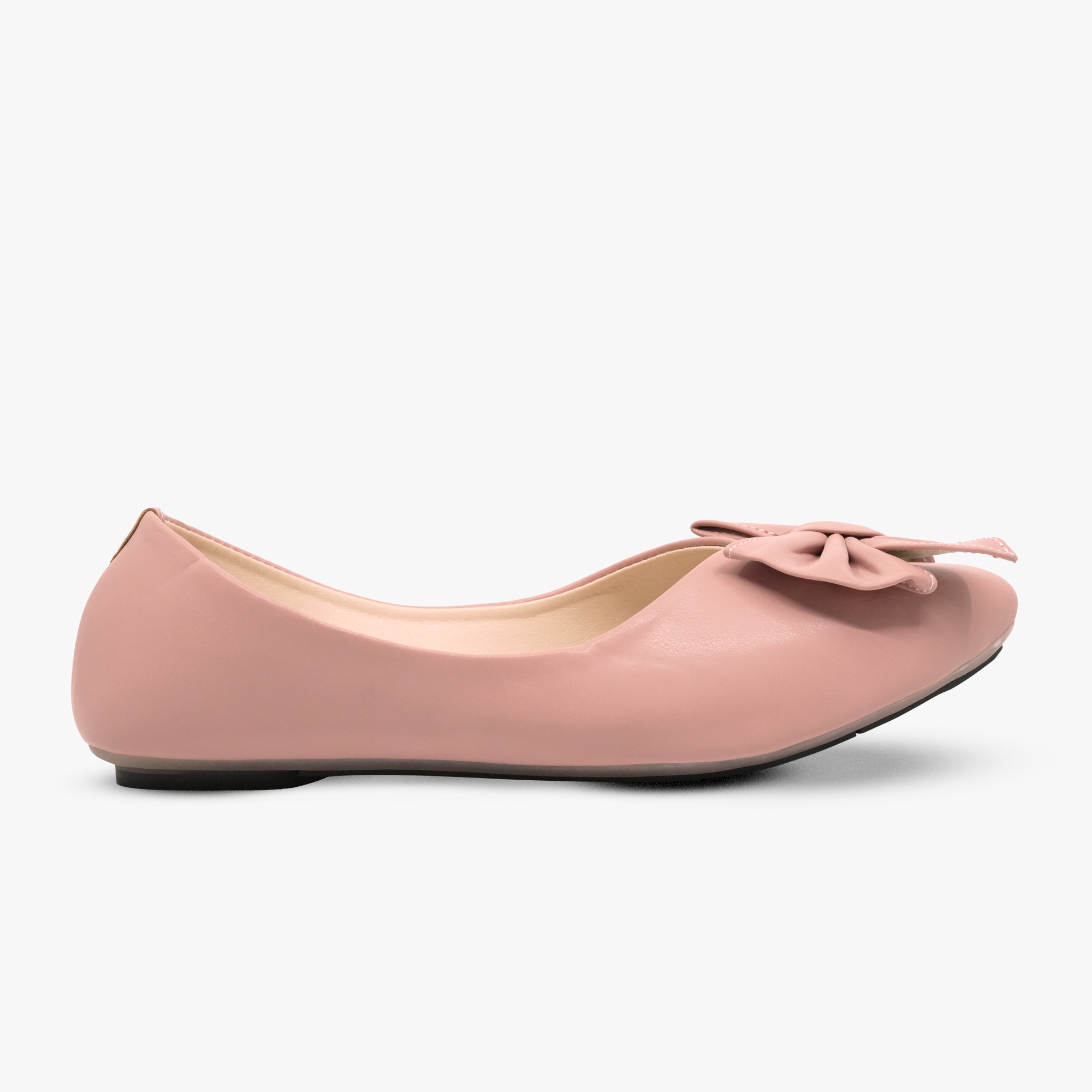 “Side view of Khowai pink bow ballet flats with a closed-toe design”