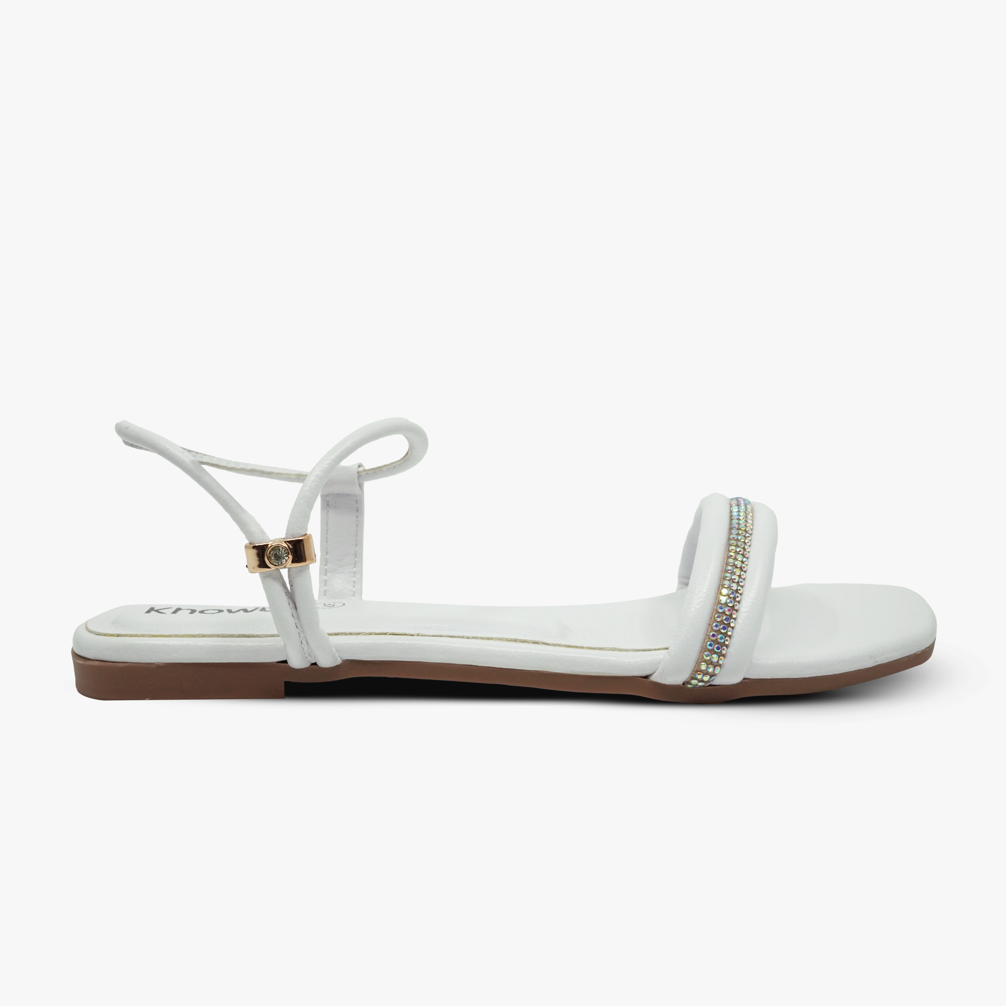 “Side view of Khowai white flat sandals with rhinestone-embellished front strap”