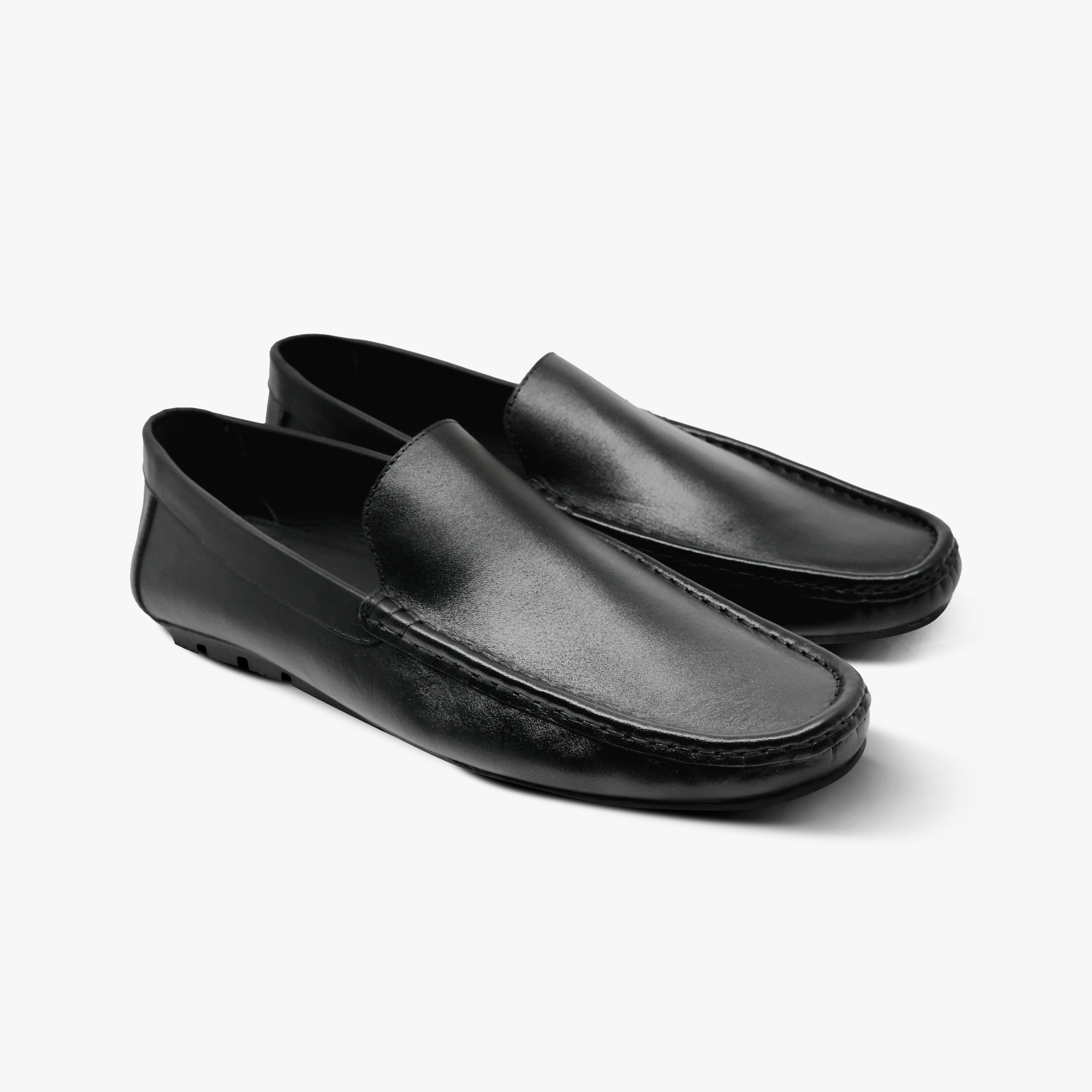 “Front angle of Khowai men’s slip-on loafers with moc-toe stitching”